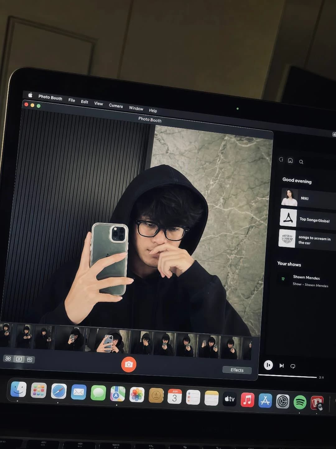 Zaky Irsyad Rais taking a mirror photo through Photo Booth